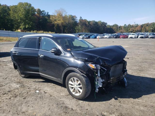 KIA SORENTO LX 2016 with VIN 5XYPG4A33GG166933 - Photo from auction
