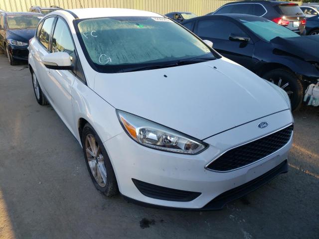 FORD FOCUS SE 2017 with VIN 1FADP3K21HL228215 - Photo from auction