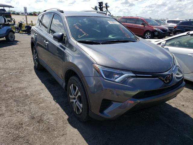 TOYOTA RAV4 LE 2018 with VIN 2T3ZFREV0JW453000 - Photo from auction