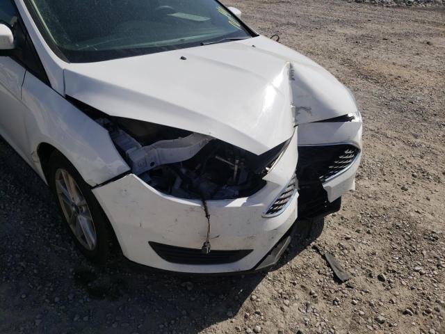 Photo 9 from auction – 2018 FORD FOCUS SE with VIN 1FADP3K24JL272621