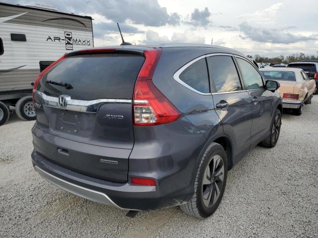 Photo 4 from auction – 2016 HONDA CR-V TOURI with VIN 5J6RM4H97GL109712
