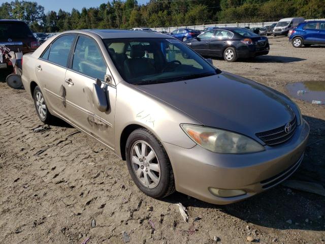 TOYOTA CAMRY LE 2003 with VIN 4T1BE30K73U715590 - Photo from auction