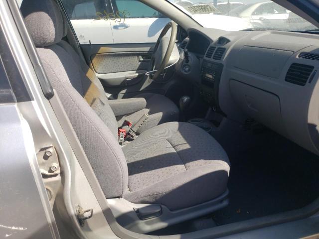 Photo 5 from auction – 2004 KIA RIO with VIN KNADC125446298558