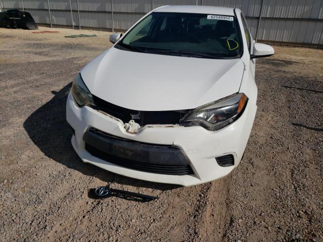 Photo 9 from auction – 2014 TOYOTA COROLLA L with VIN 5YFBURHE5EP029489