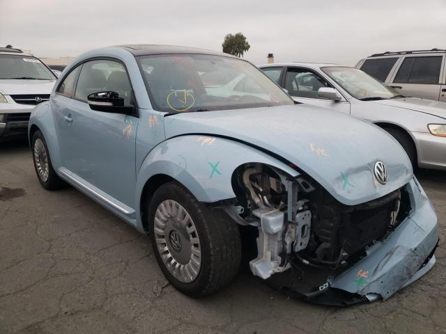 Photo 9 from auction – 2014 VOLKSWAGEN BEETLE with VIN 3VWJP7AT7EM630164