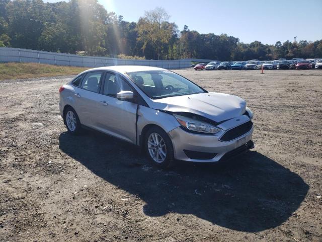 FORD FOCUS 2015 with VIN 1FADP3F2XFL289697 - Photo from auction