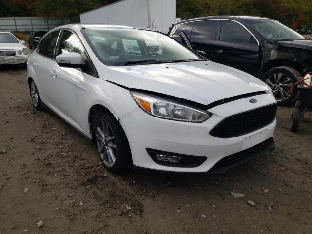 FORD FOCUS SE 2016 with VIN 1FADP3F21GL303956 - Photo from auction