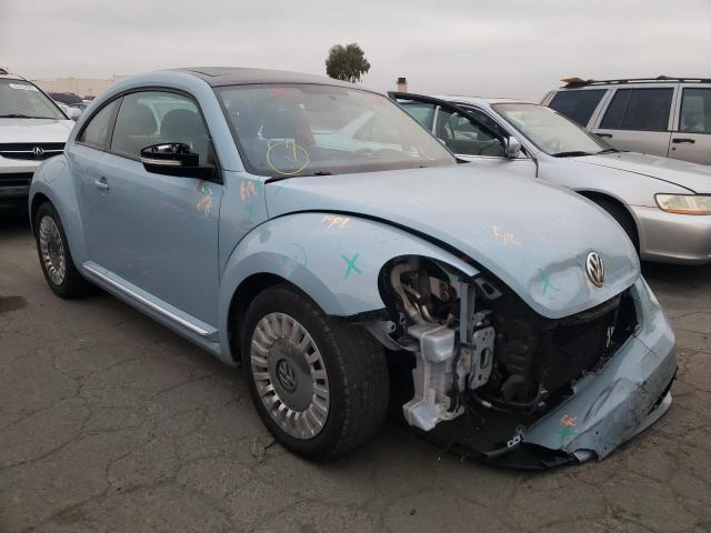 VOLKSWAGEN BEETLE 2014 with VIN 3VWJP7AT7EM630164 - Photo from auction