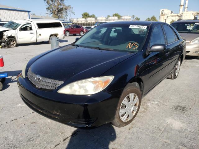 Photo 2 from auction – 2002 TOYOTA CAMRY LE with VIN JTDBE32K920128024