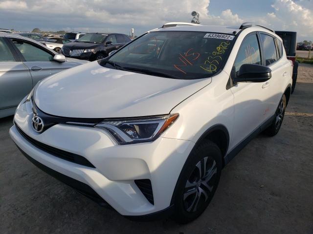 Photo 2 from auction – 2016 TOYOTA RAV4 LE with VIN JTMZFREV5GJ075277