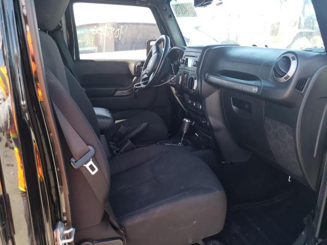 Photo 5 from auction – 2015 JEEP WRANGLER U with VIN 1C4BJWDG1FL676951