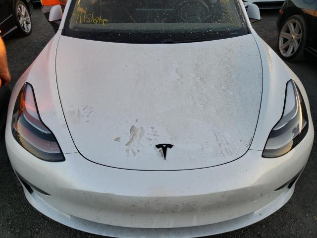 Photo 7 from auction – 2021 TESLA MODEL 3 with VIN 5YJ3E1EAXMF046979