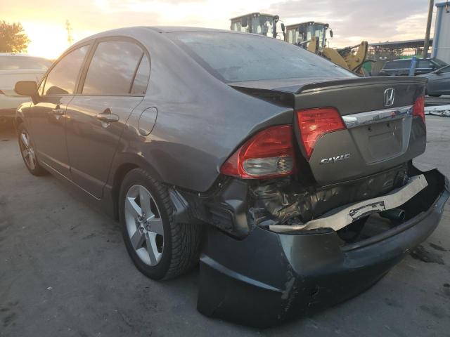 Photo 3 from auction – 2011 HONDA CIVIC LX-S with VIN 19XFA1F65BE028072