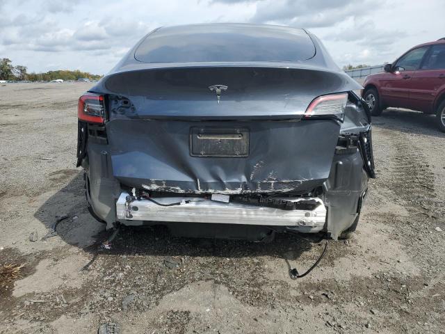 Photo 9 from auction – 2021 TESLA MODEL Y with VIN 5YJYGDED6MF107840