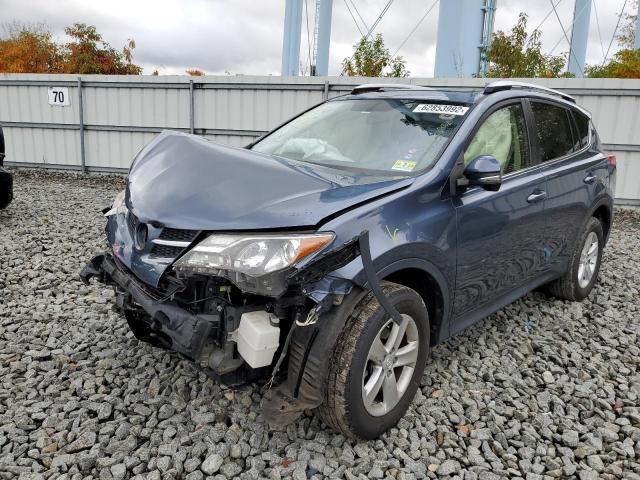 Photo 2 from auction – 2014 TOYOTA RAV4 XLE with VIN JTMRFREVXED067249