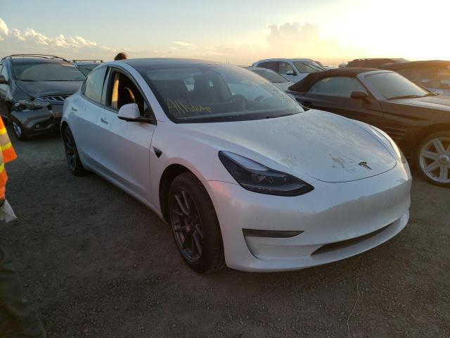 TESLA MODEL 3 2021 with VIN 5YJ3E1EAXMF046979 - Photo from auction