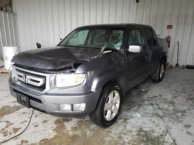 Photo 2 from auction – 2011 HONDA RIDGELINE with VIN 5FPYK1F54BB002075