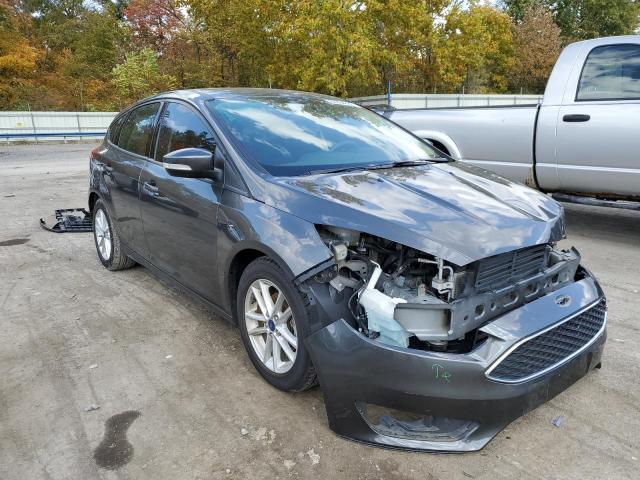 FORD FOCUS SE 2017 with VIN 1FADP3K23HL214056 - Photo from auction