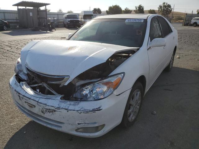 Photo 2 from auction – 2004 TOYOTA CAMRY LE with VIN JTDBE30K040251524