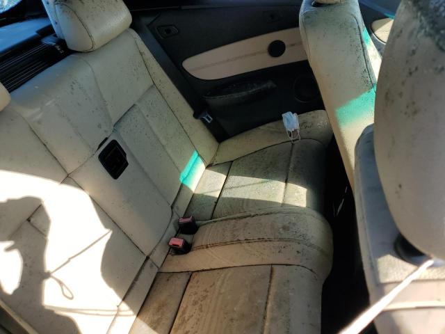 Photo 10 from auction – 2009 BMW 128 I with VIN WBAUN13599VH81357