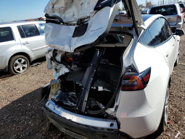 Photo 9 from auction – 2021 TESLA MODEL Y with VIN 5YJYGAEE6MF211395