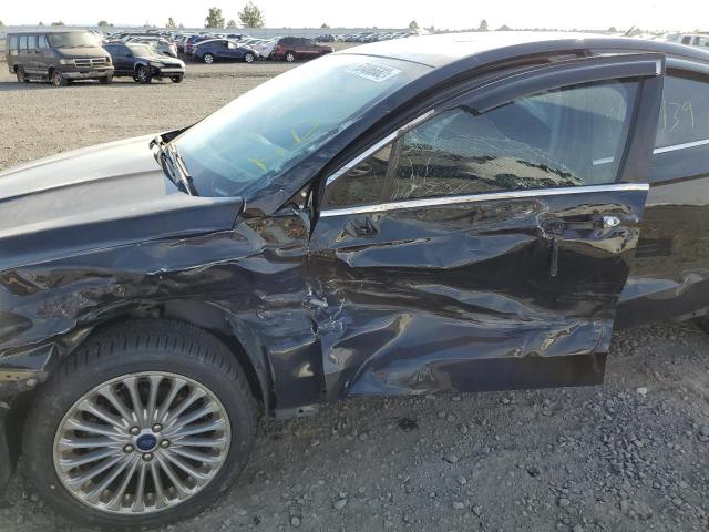 Photo 9 from auction – 2016 FORD FUSION TIT with VIN 3FA6P0D94GR268855