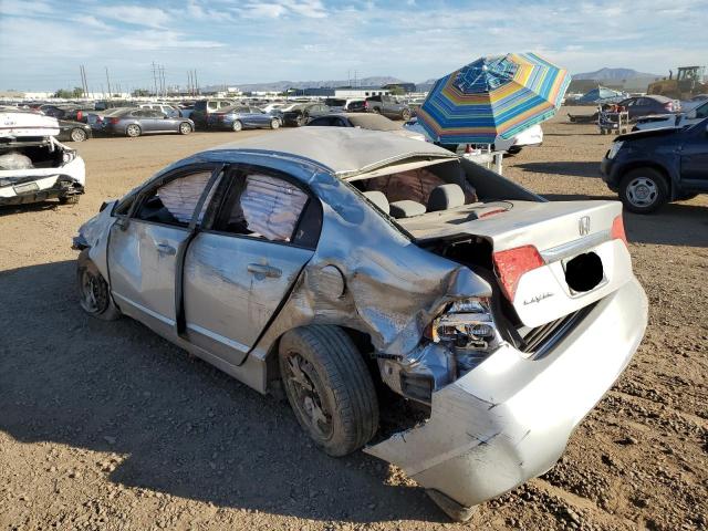 Photo 3 from auction – 2011 HONDA CIVIC LX with VIN 19XFA1F53BE039871