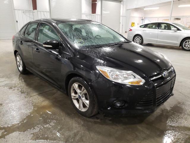 FORD FOCUS SE 2014 with VIN 1FADP3F28EL391059 - Photo from auction