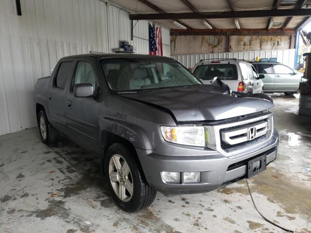 HONDA RIDGELINE 2011 with VIN 5FPYK1F54BB002075 - Photo from auction