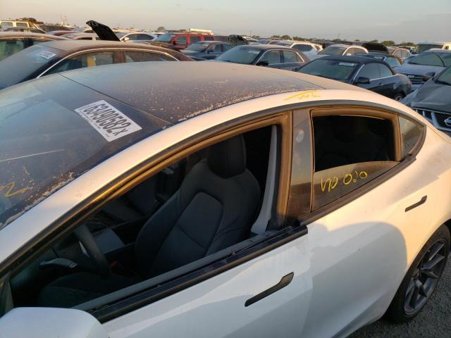 Photo 9 from auction – 2021 TESLA MODEL 3 with VIN 5YJ3E1EAXMF046979