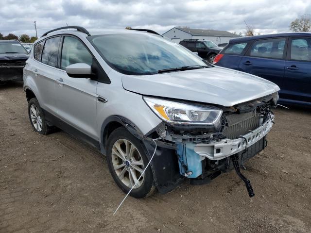 FORD ESCAPE SE 2018 with VIN 1FMCU9GD2JUB82661 - Photo from auction