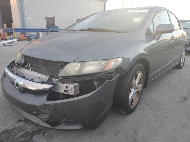 Photo 2 from auction – 2011 HONDA CIVIC LX-S with VIN 19XFA1F65BE028072
