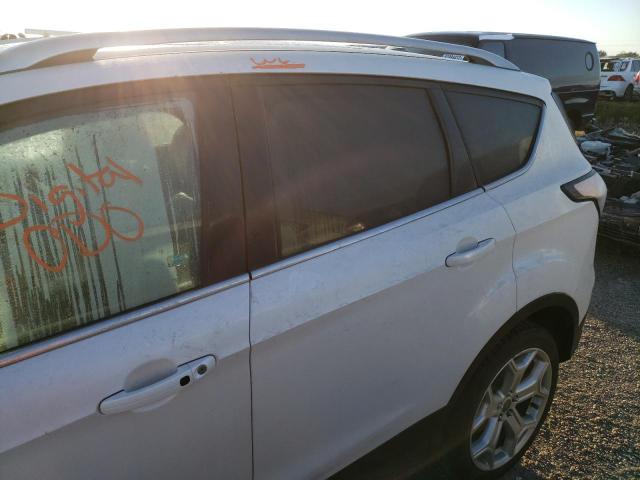Photo 9 from auction – 2017 FORD ESCAPE TIT with VIN 1FMCU9J97HUC87971