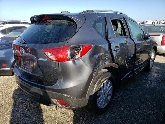 Photo 4 from auction – 2014 MAZDA CX-5 TOURI with VIN JM3KE2CYXE0303745