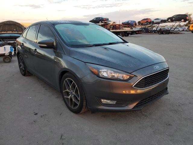 FORD FOCUS SEL 2017 with VIN 1FADP3H24HL327330 - Photo from auction