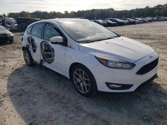 FORD FOCUS SE 2015 with VIN 1FADP3K21FL283213 - Photo from auction