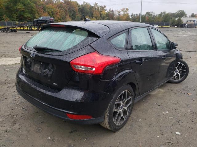 Photo 4 from auction – 2018 FORD FOCUS SEL with VIN 1FADP3M2XJL220908