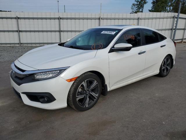 Photo 2 from auction – 2017 HONDA CIVIC TOUR with VIN 2HGFC1F98HH647879