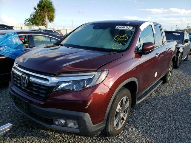 Photo 2 from auction – 2019 HONDA RIDGELINE with VIN 5FPYK3F73KB017681