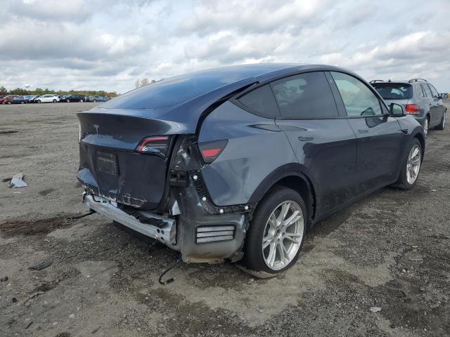 Photo 4 from auction – 2021 TESLA MODEL Y with VIN 5YJYGDED6MF107840