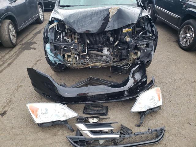 Photo 9 from auction – 2011 HONDA CR-V SE with VIN 5J6RE4H49BL078490