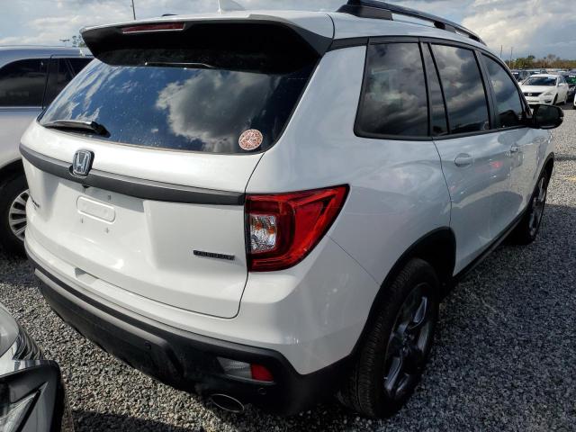 Photo 4 from auction – 2021 HONDA PASSPORT T with VIN 5FNYF7H98MB004091