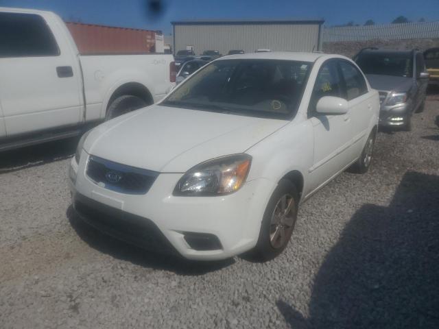 Photo 2 from auction – 2011 KIA RIO BASE with VIN KNADH4A3XB6749783
