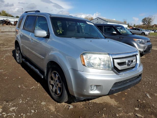 HONDA PILOT TOUR 2010 with VIN 5FNYF4H97AB013598 - Photo from auction