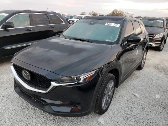 Photo 2 from auction – 2021 MAZDA CX-5 GRAND with VIN JM3KFADMXM0378169