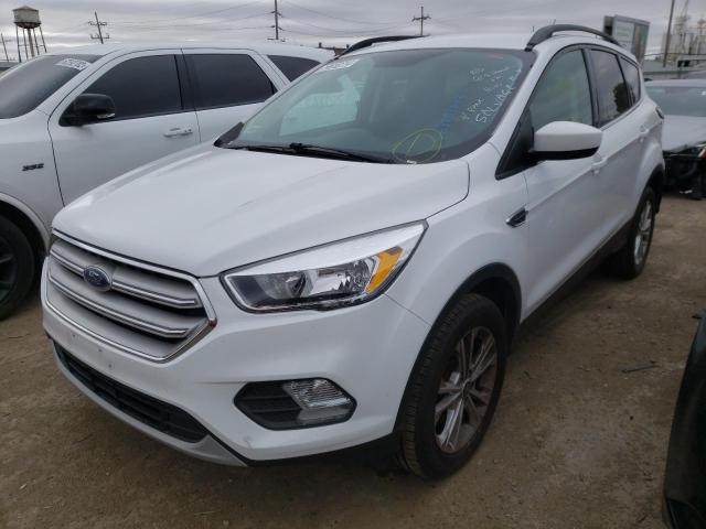 FORD ESCAPE SE 2018 with VIN 1FMCU9GD7JUB82672 - Photo from auction