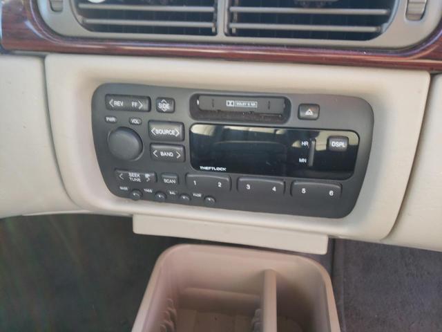 Photo 9 from auction – 1999 CADILLAC DEVILLE with VIN 1G6KD54Y2XU750855