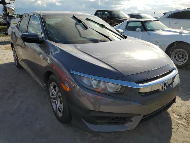 HONDA CIVIC LX 2018 with VIN 19XFC2F56JE011626 - Photo from auction