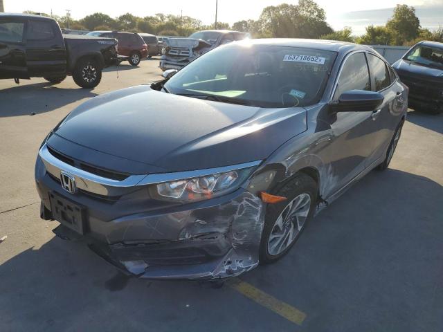 Photo 2 from auction – 2017 HONDA CIVIC EX with VIN 2HGFC2F70HH565620
