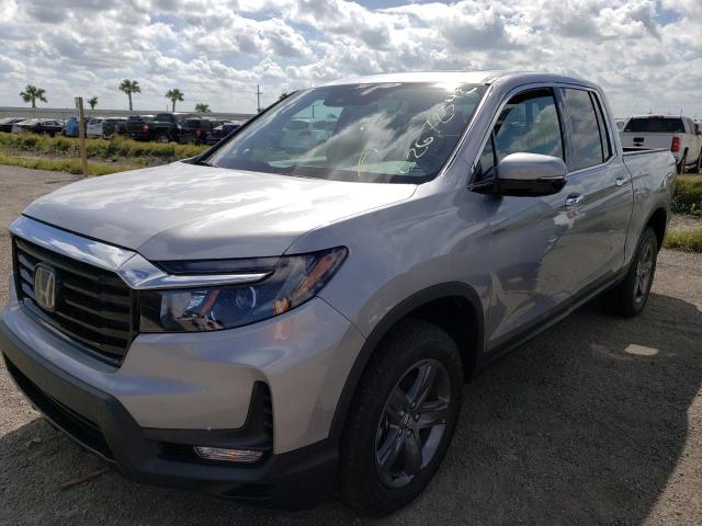 Photo 2 from auction – 2021 HONDA RIDGELINE with VIN 5FPYK3F73MB004383